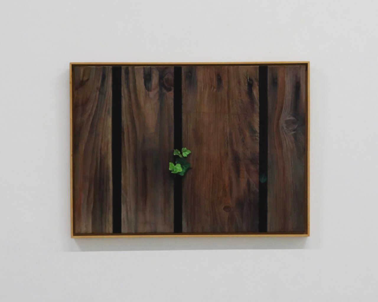 Artist Chan Kin-Chung’s 1982 work -- Composition No. 3-82 depicts the composition of the fence and leaves